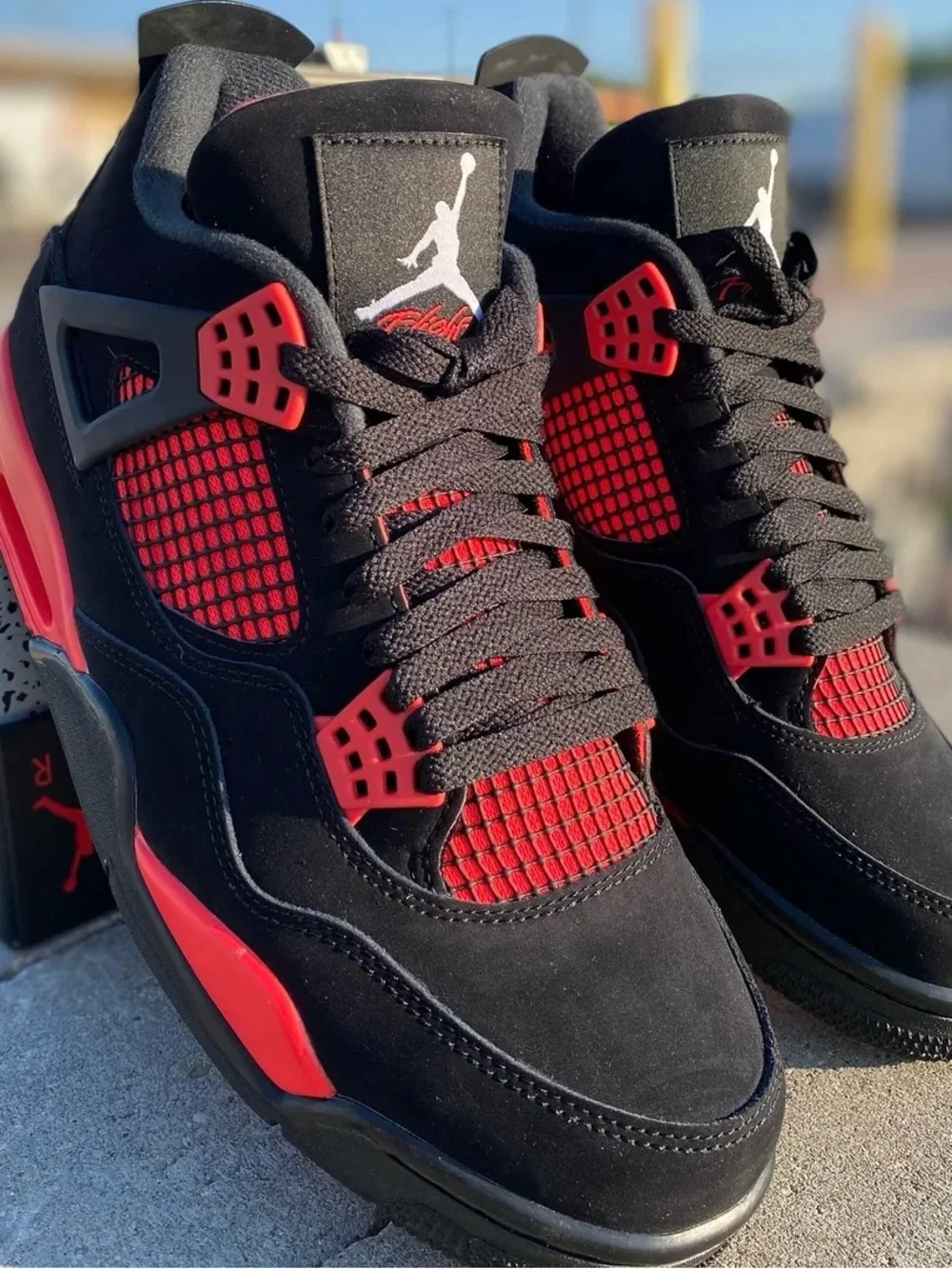 Jordan Men’s Black and Red Retro Sneakers